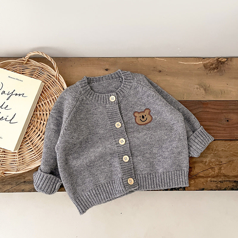 Stickad kofta för baby – mjuk och tidlös