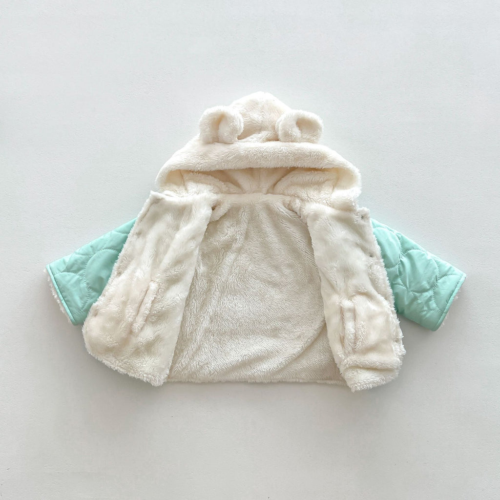 Mysig fleecefodrad jacka med quiltad design