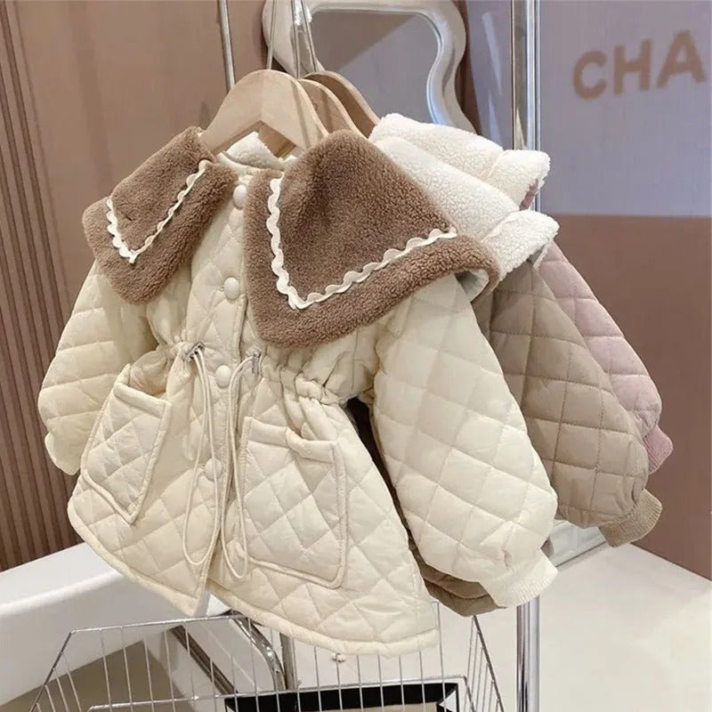 Tjock, vadderad jacka  i sammet och bomull