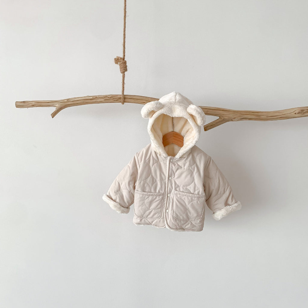 Mysig fleecefodrad jacka med quiltad design