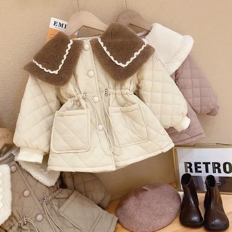 Tjock, vadderad jacka  i sammet och bomull